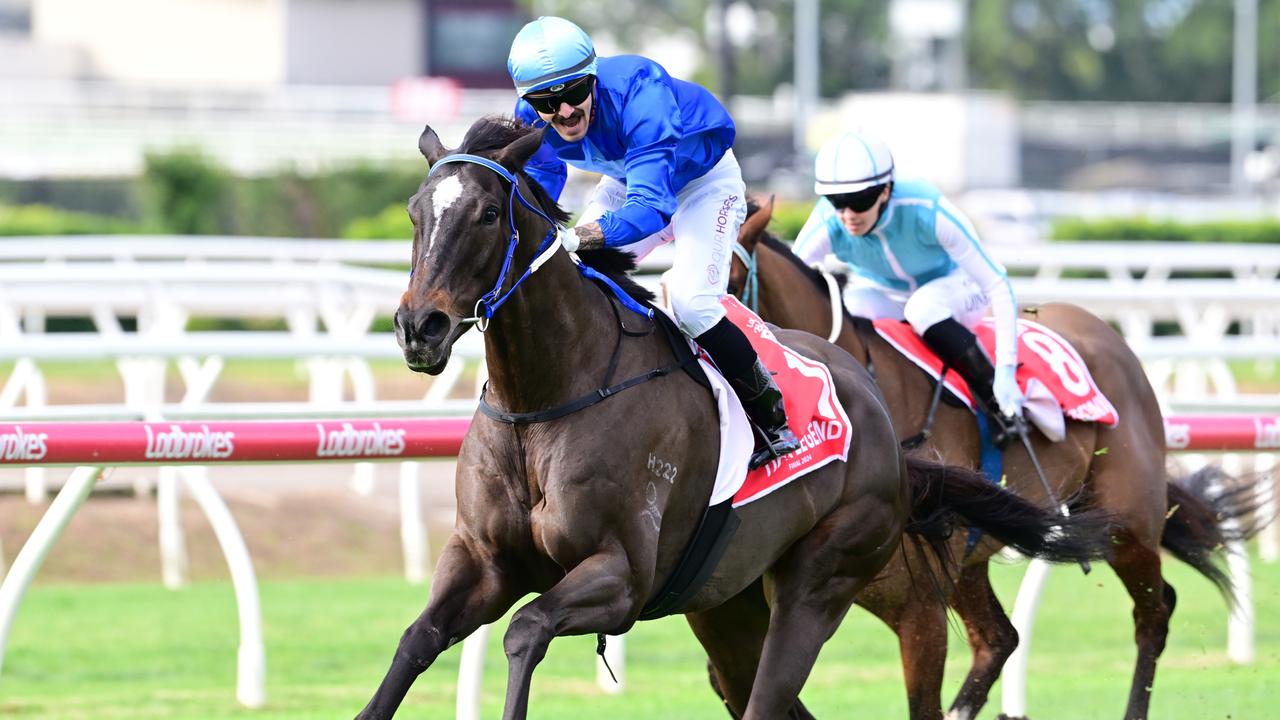 Tiger Legend wins the Battle Of The Bush Final at Eagle Farm for jockey Ash Butler and trainer John Manzelmann. Picture: Grant Peters - Trackside Photography