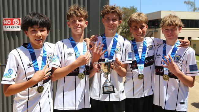 Balgownie JFC under-14s stars celebrate their Champion of Champions victory. Picture: Daniel Rowen | Balgownie JFC