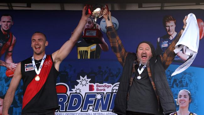 Riddell captain Josh Grabham and coach Justin Belleville left the cup. Picture: Hamish Blair