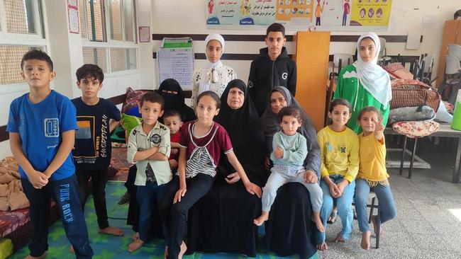 Raed Zannoun's mother Alia with other family members taking shelter in the Fatima Al-Khatib School. Picture: Supplied