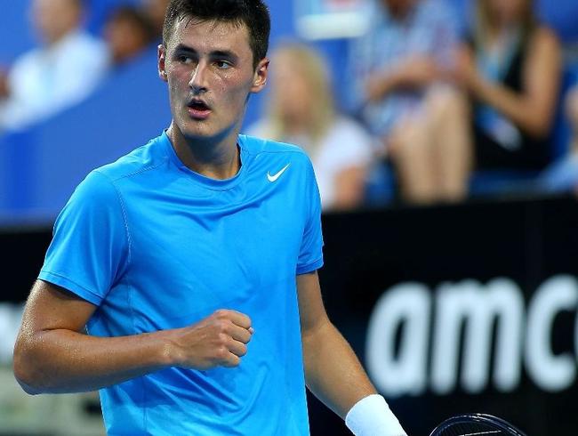 Bernard Tomic of Australia celebrates winning a point in his singles match against Novak Djokovic of Serbia during day five of the Hopman Cup at Perth Arena on January 2, 2013 in Perth, Australia. Picture: Paul Kane / Getty Images