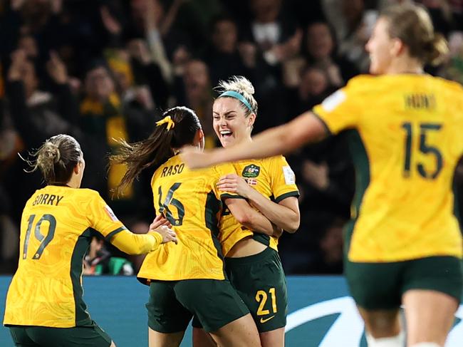 SYDNEY, AUSTRALIA - AUGUST 07: Hayley Raso of Australia celebrates with Ellie Carpenter of Australia after scoring her team's second goal during the FIFA Women's World Cup Australia & New Zealand 2023 Round of 16 match between Australia and Denmark at Stadium Australia on August 07, 2023 in Sydney, Australia. (Photo by Brendon Thorne/Getty Images )