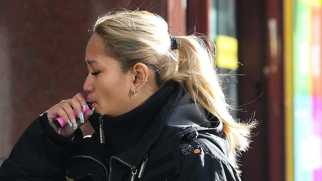 SYDNEY, AUSTRALIA - Newswire Photos -MAY 02 2023:  A general view of people seen vaping in the CBD in Sydney as Governmentâs plans to reduce smoking and stamp out recreational vaping â particularly among young Australians â through stronger legislation, enforcement, education and support. The 2023â24 budget will include $234m to fund new measures to protect Australians against the harm caused by tobacco and vaping products. Picture: NCA Newswire / Gaye Gerard