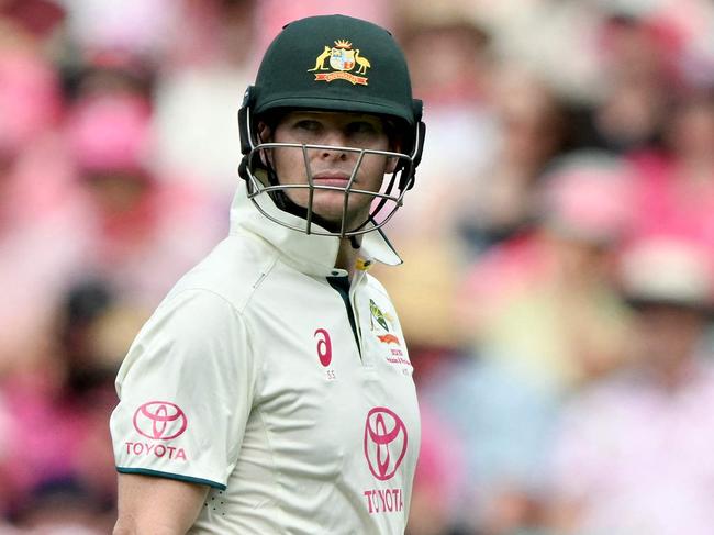 Australiaâs Steve Smith walks off the field after his dismissal during the third day of the third cricket Test match between Australia and Pakistan at the Sydney Cricket Ground in Sydney on January 5, 2024. (Photo by Saeed KHAN / AFP) / -- IMAGE RESTRICTED TO EDITORIAL USE - STRICTLY NO COMMERCIAL USE --