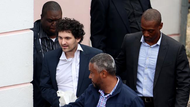 FTX co-founder Sam Bankman-Fried is escorted out of the Magistrate's Court in Nassau, Bahamas on December 21. Picture: Joe Raedle/Getty Images