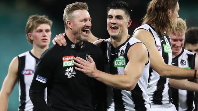 Buckley laps up his last game in charge with Brayden Maynard. Picture: Getty Images