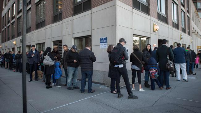 Voters queue for a poll outside Trump place in New York. Picture: AFP/ Bryan R. Smith