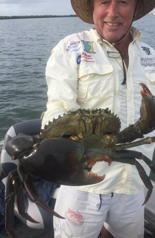 Fisherman Mark Rodgers with a top quality, legal-size muddie from the Gold Coast Broadwater.