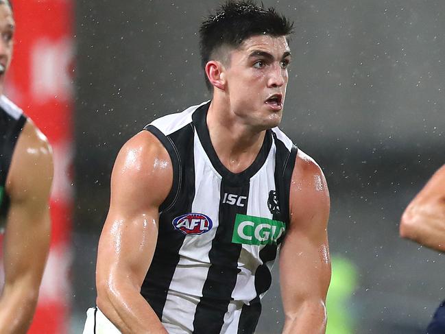 BRISBANE, AUSTRALIA - AUGUST 15: Brayden Maynard of the Magpies makes a run during the round 12 AFL match between the Melbourne Demons and the Collingwood Magpies at The Gabba on August 15, 2020 in Brisbane, Australia. (Photo by Jono Searle/AFL Photos/via Getty Images)