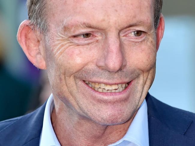 MANLY DAILY/AAP. Tony Abbott outside a pre-poll voting centre at Brookvale on Thursday, May 16. Tony Abbott is fighting to hold on to his seat of Warringah against political newcomer Zali Steggall. AAP IMAGE / Troy Snook)