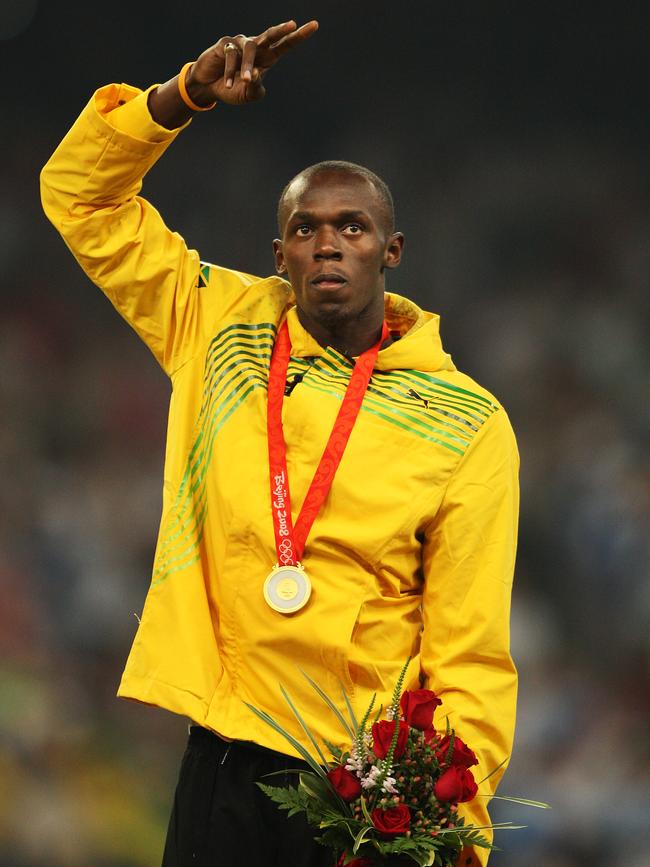 Beijing Olympics 2008. Day 9 Athletics. Usain Bolt receives his gold medal for winning the men’s 100m last night. Picture: Phil Hillyard/News Corp Australia