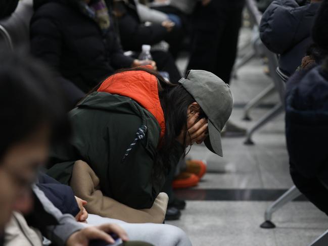 A relative of a passenger of the aircraft reacts at the Muan International Airport on December 29, 2024 in Muan-gun, South Korea. Picture: Chung Sung-Jun/Getty Images