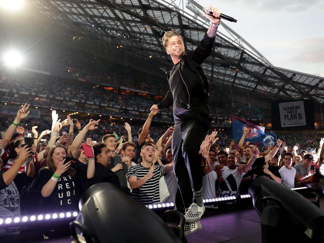 Ryan Tedder of OneRepublic delivered an impressive catalogue of pop earworms at the NRL Grand Final on Sunday. But did anyone really care? Picture: Mark Metcalfe/Getty Images