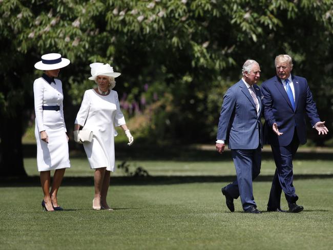 President Donald Trump walks with Prince Charles and first lady Melania Trump walks with Camilla, the Duchess of Cornwall. Picture: AFP