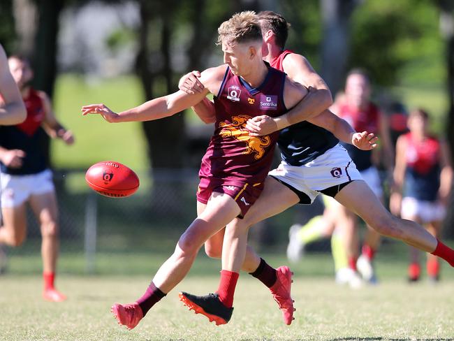 Round 6 QAFL game between reigning premiers Palm Beach Currumbin Lions and Surfers Paradise Demons at Salk Oval. Photo of Zane Baker (D's) and Reyne Harris. Gold Coast 11th May, 2019 AAP Image/Richard Gosling