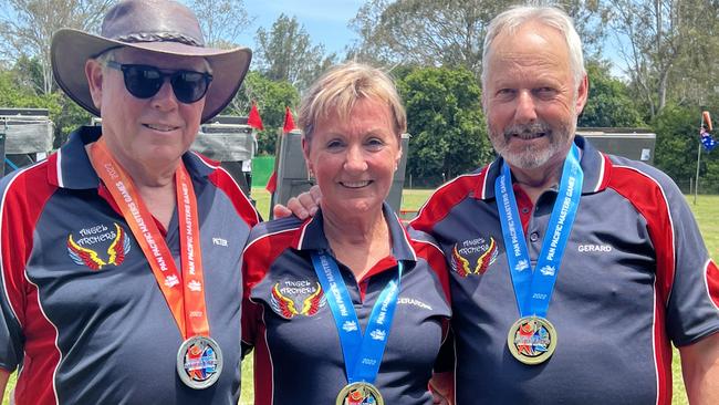 Peter Nelson-Furnell (left) with Gerardine and Gerard Middendorp, Pan Pacific champions.