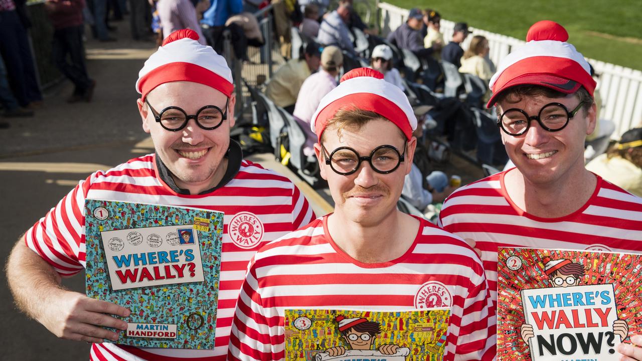 Where's Wally (from left) Nathan Wehl, Brady Gwynne and Josh Muhldorff support Toowoomba Rangers and get in an inside joke aimed at Tim Bailey. Picture: Kevin Farmer