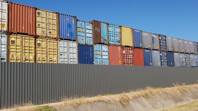 The containers are unlikely to be moved because SKM Recycling is closing down its Victorian operations amid financial uncertainty. Picture: COLIN JAMES