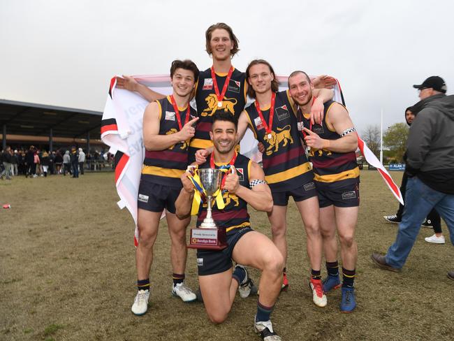 Doncaster East players pose for a photograph after winning the EFL Div 2 Grand Final.
