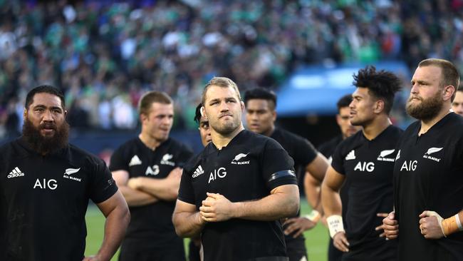 Dejected New Zealand players look on following their team's 40-29 defeat.