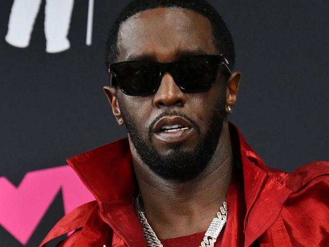 (FILES) (FILES) US producer-musician Sean "Diddy" Combs poses with the Global Icon award in the press room during the MTV Video Music Awards at the Prudential Center in Newark, New Jersey, on September 12, 2023. Music mogul Sean Combs is set to go on trial for racketeering and sex trafficking on May 5, 2025, a judge said in a court hearing October 10, 2024. The rapper known as "Diddy" will remain incarcerated, said federal judge Arun Subramanian, after he was indicted last month on three criminal counts that allege he sexually abused women and coerced them into drug-fueled sex parties using threats and violence. (Photo by ANGELA WEISS / AFP)