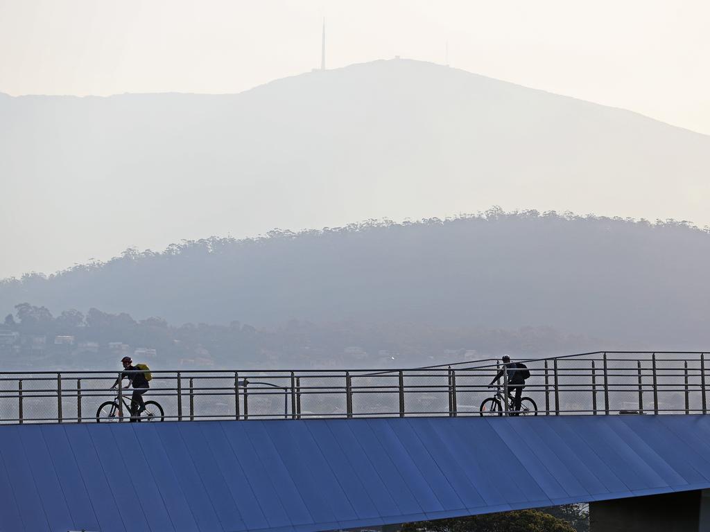 Smoke blocks out kunanyi/Mount Wellington, as seen from near the Brige of Remembrance. Picture: Zak Simmonds