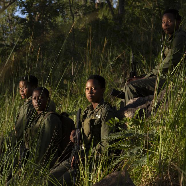 Akashinga Rangers Wadzanai Munemo, Petronella Chigumbira, Margaret Darawanda and Abigail Malzanyaire (left to right) during a morning patrol at Phundundu Wildlife Park, near Nyamakate, Zimbabwe. Picture: Davina Jogi