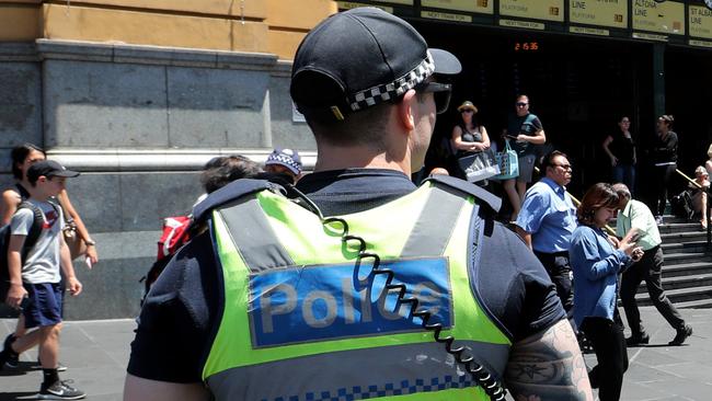 Police officers at Flinders St Station. Picture: David Geraghty/The Australian