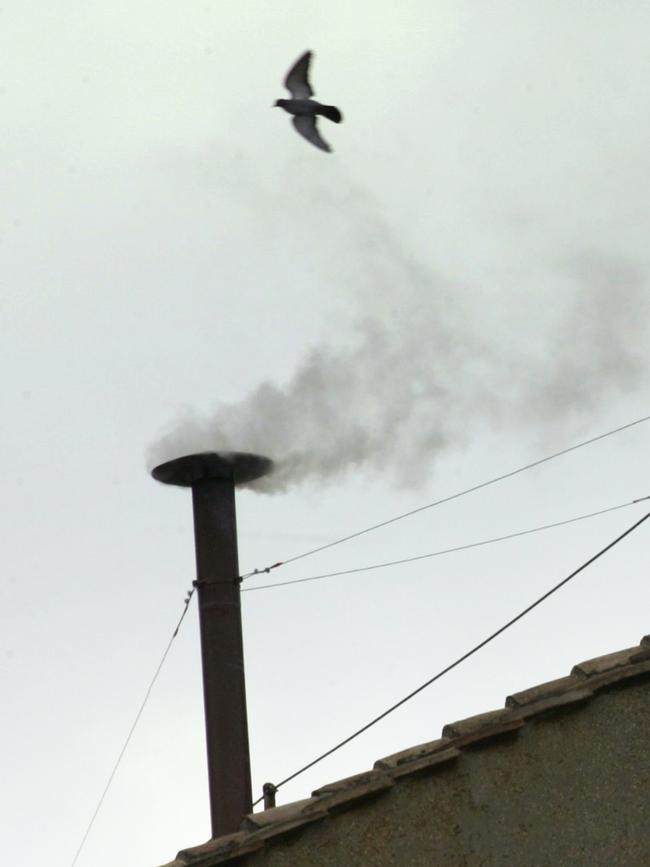 White smoke rises above the Sistine Chapel. Picture: AFP