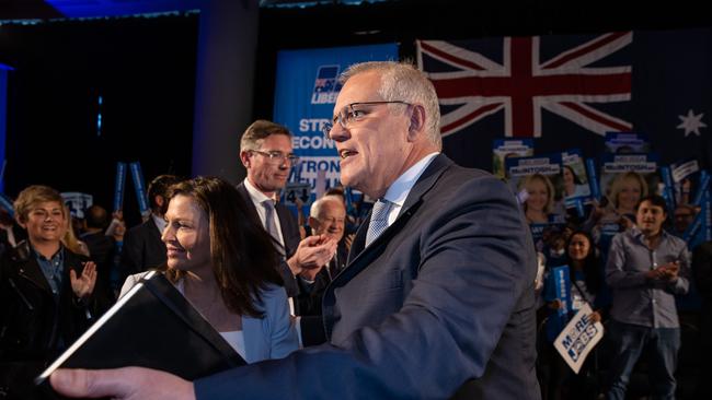 Scott Morrison with his wife Jenny Morrison at Accor stadium in the electorate of Reid. Picture: Jason Edwards