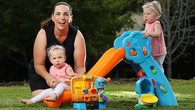 Shelley Naughton sticks to screen time guidelines with her one-year-old twins Imogen and Sophie. Picture: Nigel Hallett