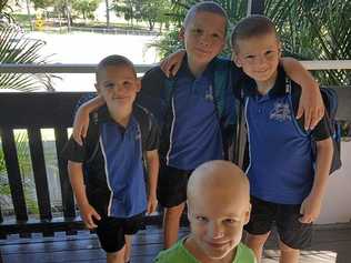 Brothers Khynan, Dylan, Arlen Reid (back) and Brandon Pickering (front centre) in One Mile State School uniform. Picture: Contributed