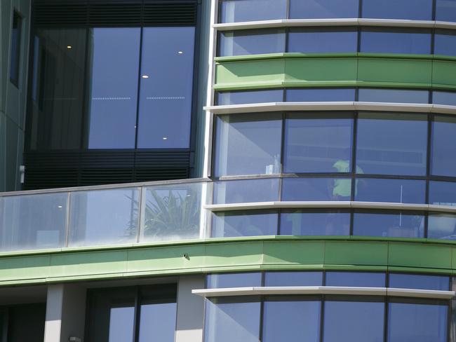 The "Opal Building" in Homebush bay. Workers arrive as a part of remediation work as repairs are needed due to large cracks forming.Photo: Tim Pascoe