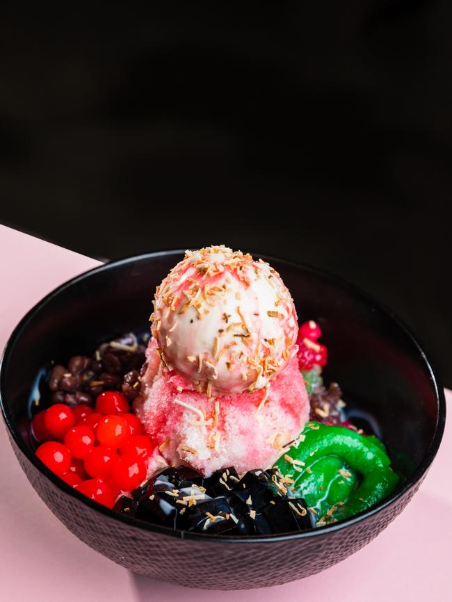 Mr Good Guy’s housemade ice kacang dessert which features shaved ice topped with a wild, colourful combo of red beans, tapioca pearls, nuts and rose syrup. Picture: Olivia Sattler