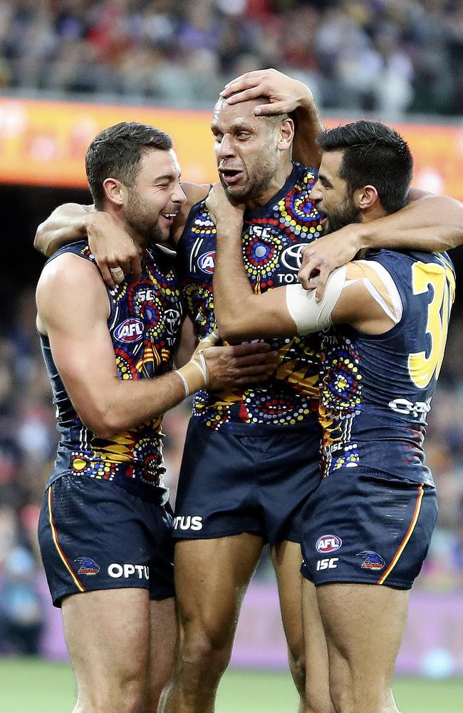 Ellis-Yolmen celebrates a goal with Rory Atkins and Wayne Milera. Picture: Sarah Reed.