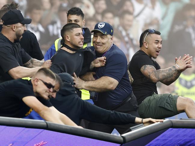 *APAC Sports Pictures of the Week - 2022, December 19* - MELBOURNE, AUSTRALIA - DECEMBER 17: Fans storm the pitch in protest during the round eight A-League Men's match between Melbourne City and Melbourne Victory at AAMI Park, on December 17, 2022, in Melbourne, Australia. (Photo by Darrian Traynor/Getty Images)