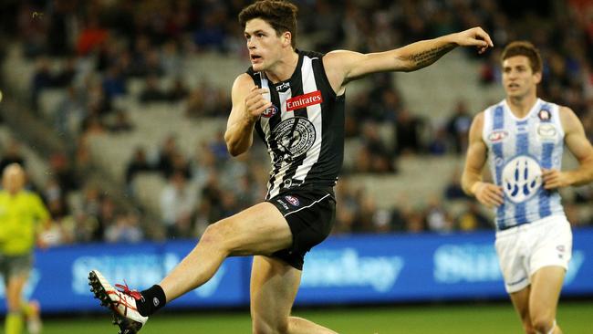 Jack Crisp kicks a long goal against the Roos. Picture: Colleen Petch.