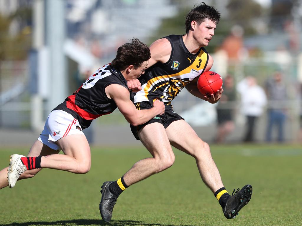 Ben Donnelly Tigers and Oscar Mansell North Launceston. TSL grand final Kingborough Tigers V North Launceston. Picture: Nikki Davis-Jones