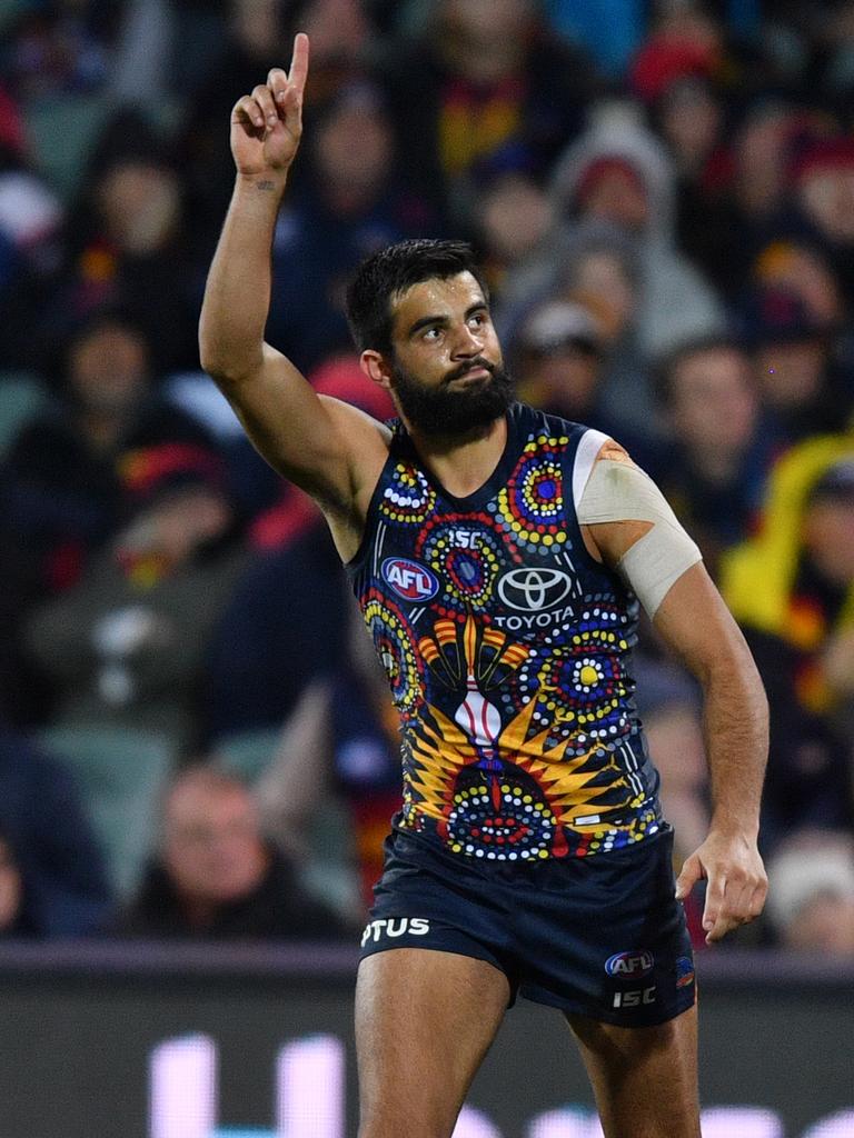 Wayne Milera of the Crows celebrates a goal against the Eagles. Picture: AAP Image/David Mariuz