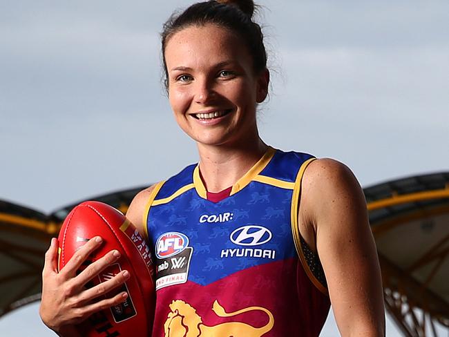 Emily Bates and the Brisbane Lions AFLW have their Captains run at Metricon Stadium. Pics Adam Head