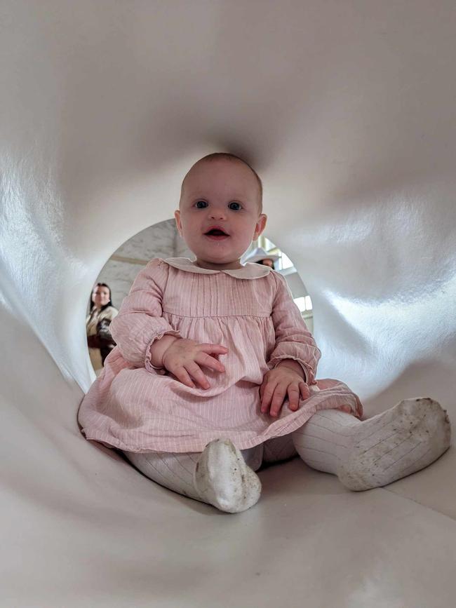 Mallorie Nicholls, 10 months old. Mallorie is the world's happiest baby. She loves monkey noises and eating everything in sight.