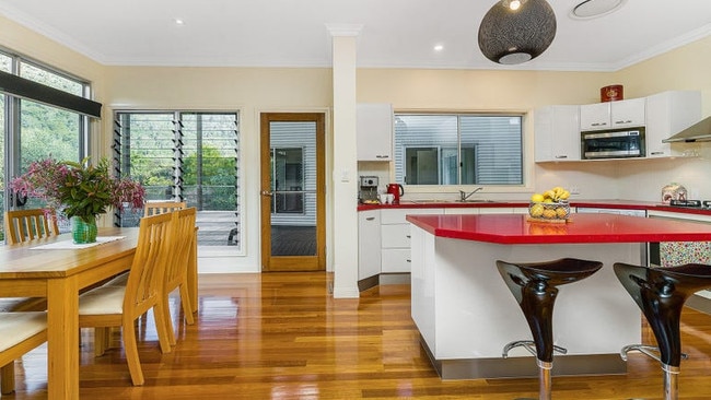 This kitchen could have also worked in the Ferrari house. Possibly only that house. Red benchtops should typically be avoided.