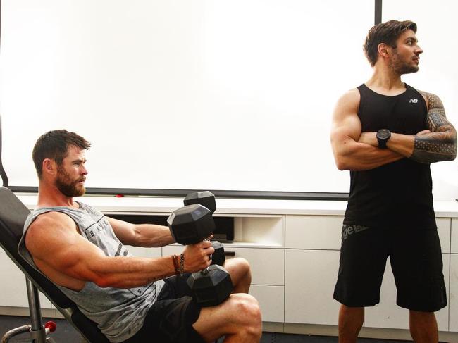 Chris Hemsworth and Luke Zocchi in the gym. Picture: Instagram. 