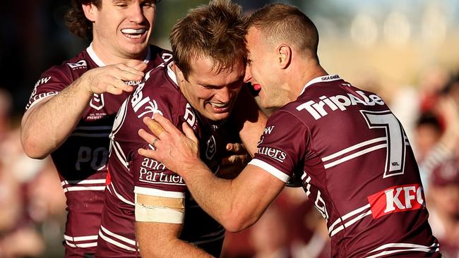 SYDNEY, AUSTRALIA - JUNE 16: Jake Trbojevic of the Sea Eagles celebrates scoring a try during the round 15 NRL match between Manly Sea Eagles and St George Illawarra Dragons at 4 Pines Park, on June 16, 2024, in Sydney, Australia. (Photo by Jeremy Ng/Getty Images)