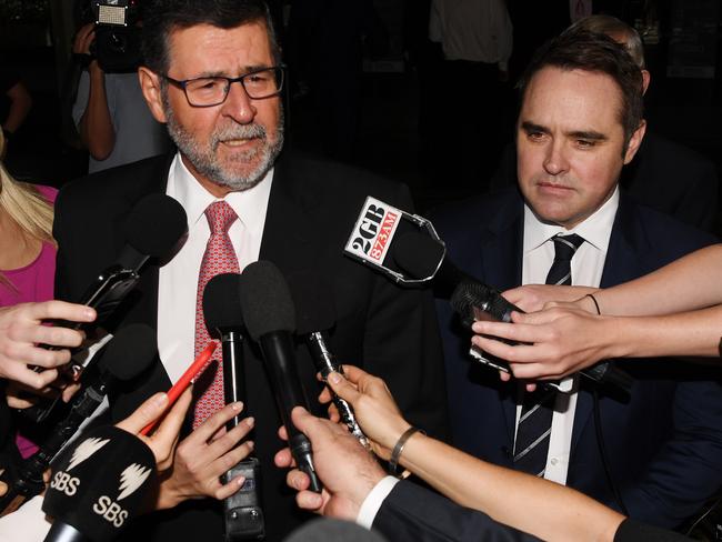 McCormack (right) looks on as his lawyer, Sam Macedone, speaks to the media. Picture: AAP