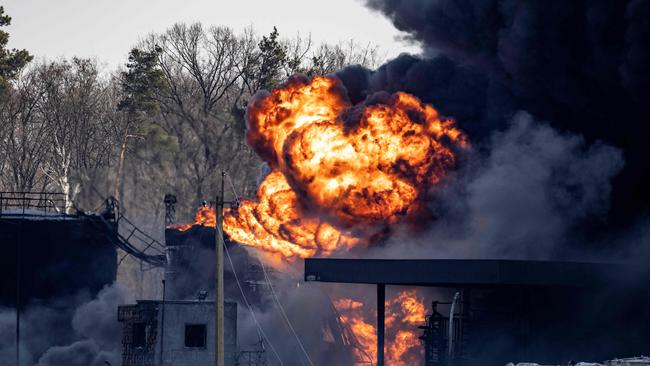 A fuel storage facility burns after Russian attacks in the city of Kalynivka. Picture: AFP