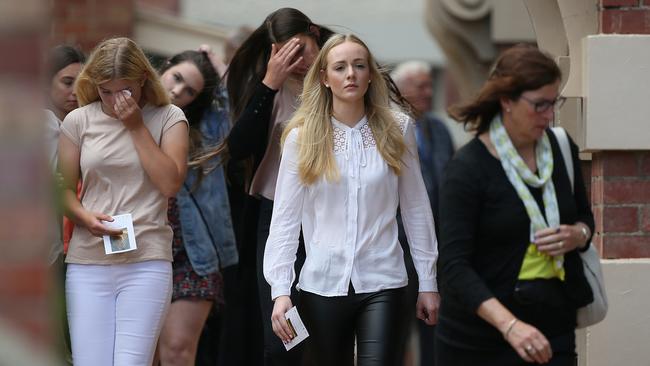 Mourners leave the funeral service of Maggie Lore. Picture: SAM ROSEWARNE