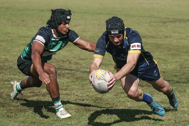 Bond University winger Harry Longes scores. Picture: Glenn Campbell