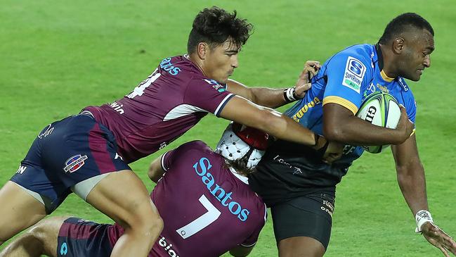 PERTH, AUSTRALIA – APRIL 23: Tevita Kuridrani of the Force is tackled by Fraser McReight of the Reds during the round 10 Super RugbyAU match between the Western Force and the Queensland Reds at HBF Park, on April 23, 2021, in Perth, Australia. (Photo by Will Russell/Getty Images)