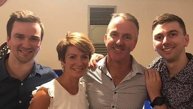 Constable Joshua Prestney (right) with his parents and brother.